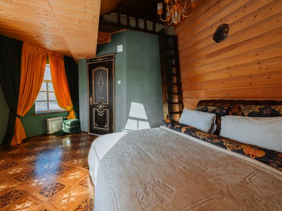 Фотография номера гостевого дома Замок в лесу