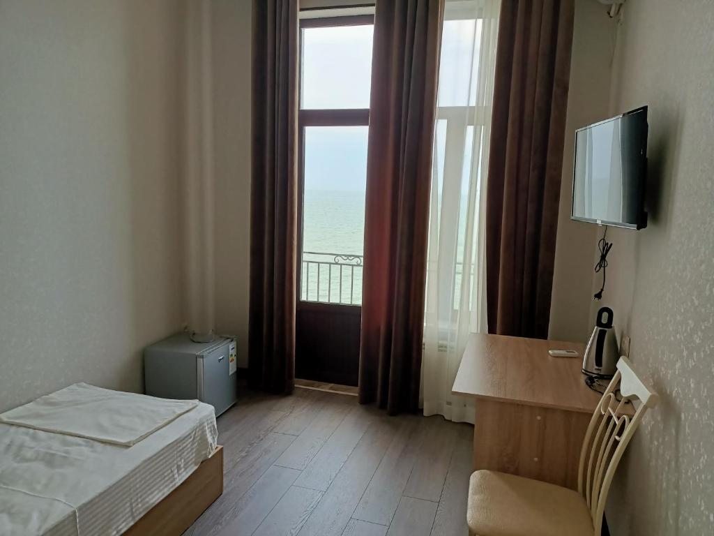 Двухместный (Улучшенный двухместный номер с 2 отдельными кроватями и видом на море) отеля Сафия, Дербент