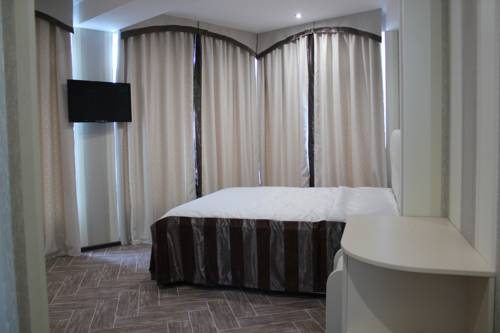 Двухместный (Двухместный номер с 1 кроватью или 2 отдельными кроватями и балконом) гостевого дома Ривьера, Гаспра