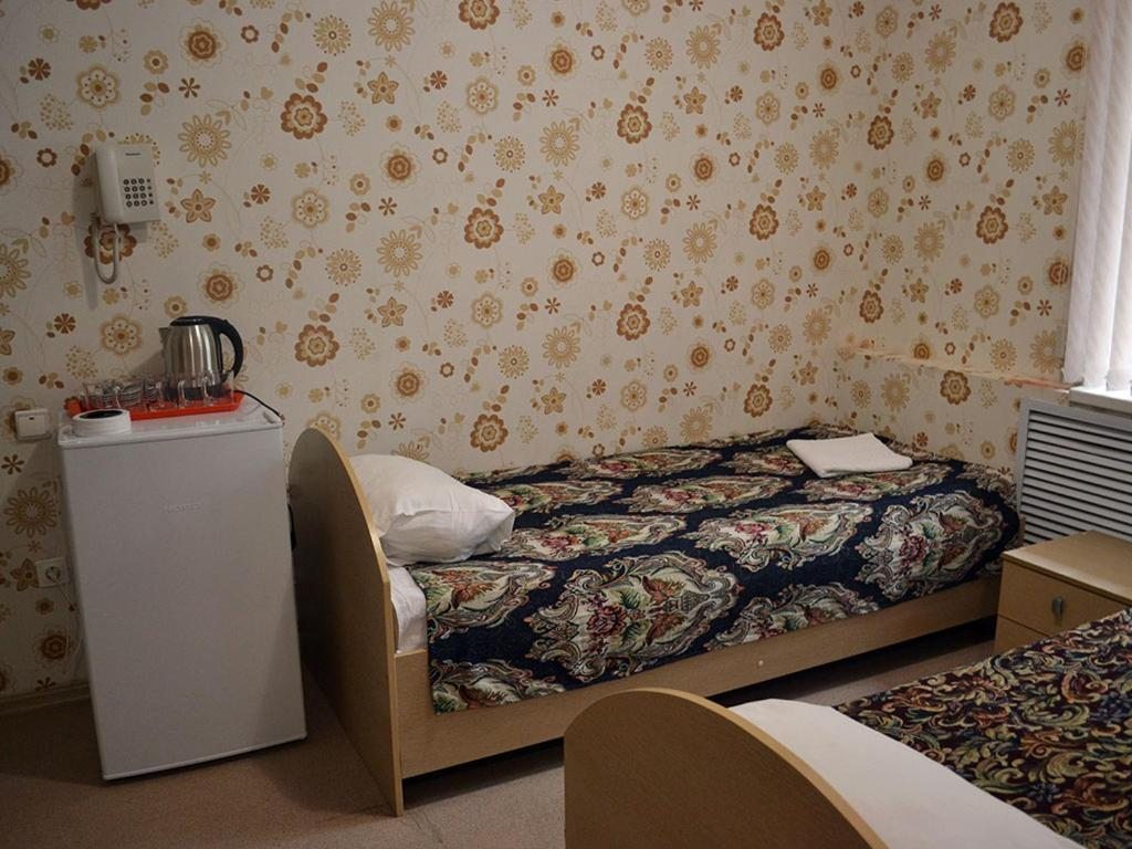 Четырехместный (Четырехместный номер с собственной ванной комнатой) отеля Солнечный Берег, Соль-Илецк
