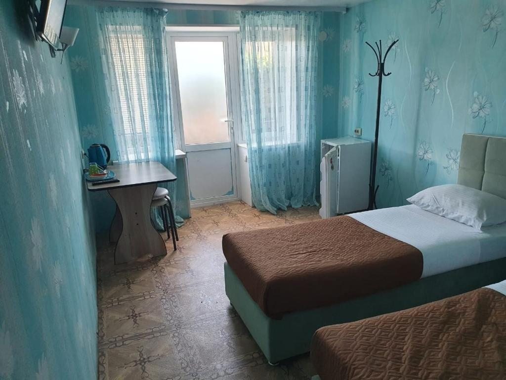 Двухместный (Стандартный двухместный номер с 2 отдельными кроватями) гостевого дома Фламинго, Соль-Илецк