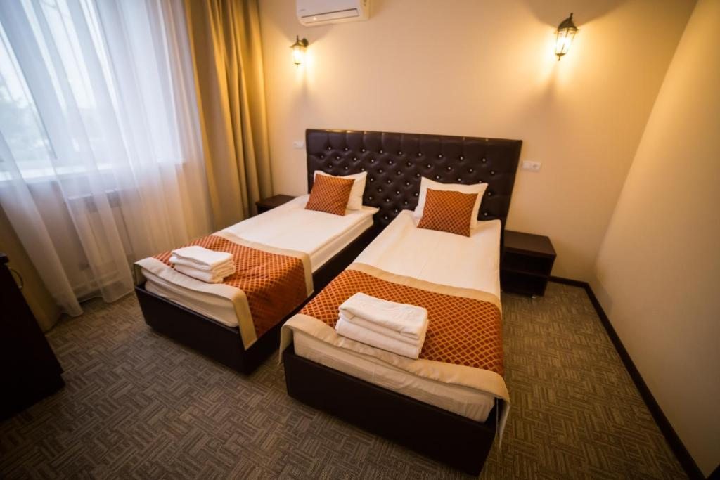 Двухместный (Двухместный номер Делюкс с 2 отдельными кроватями) отеля Гранат, Ульяновск