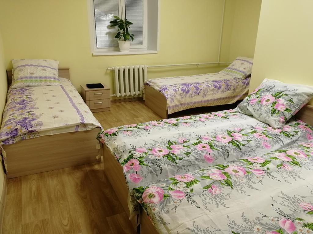 Номер (Односпальная кровать в общем номере) хостела На Белова 6, Великий Новгород