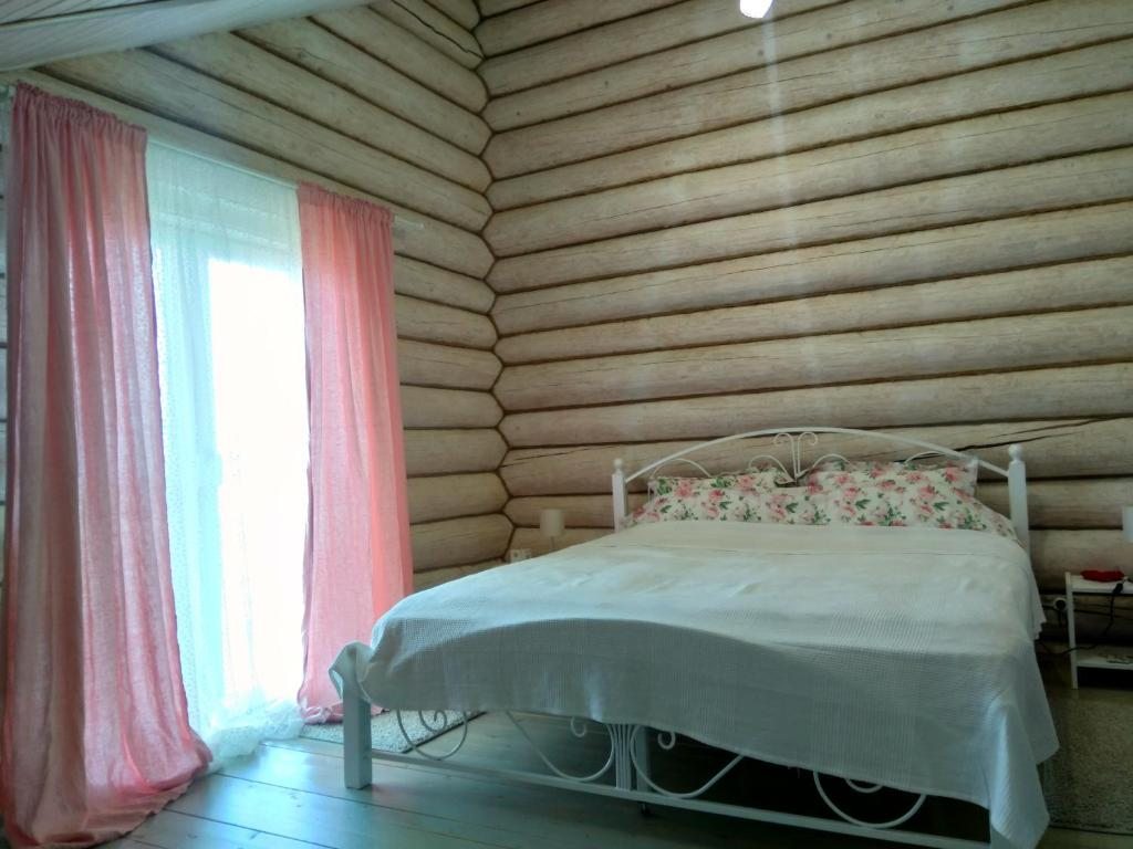 Четырехместный (Улучшенный четырехместный номер) гостевого дома На Пляжной, Осташков