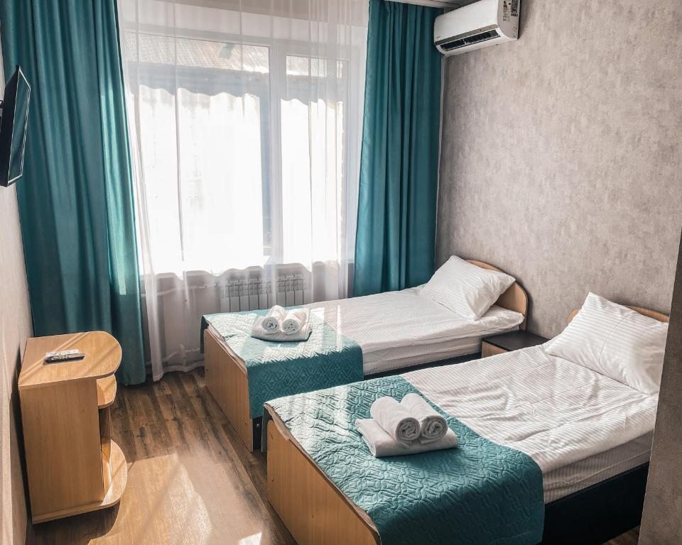Двухместный (Стандартный двухместный номер с 2 отдельными кроватями) хостела Рубин, Лениногорск