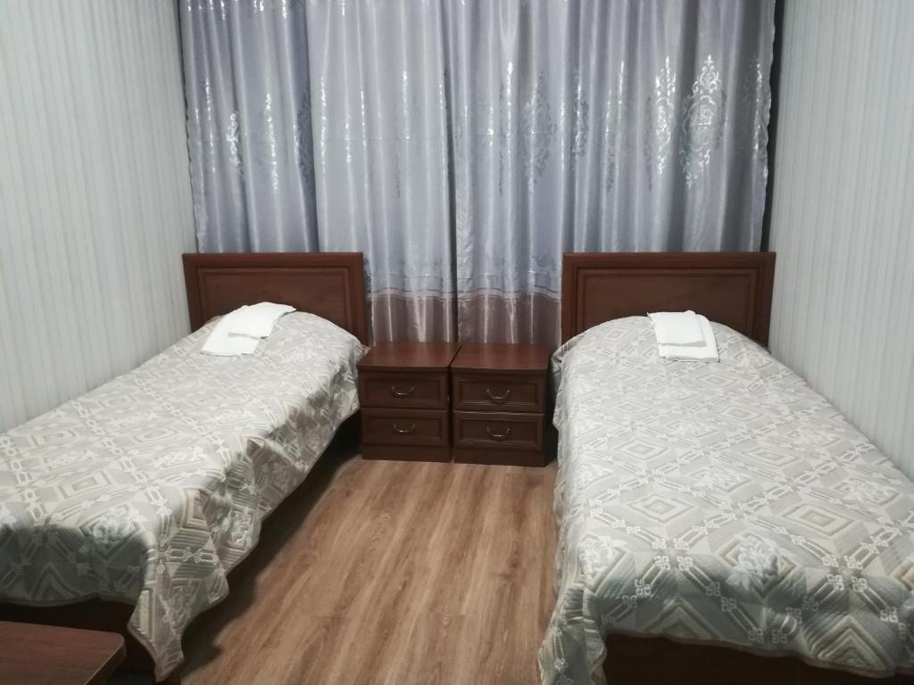 Двухместный (Двухместный номер с 2 отдельными кроватями и душем) отеля Сити, Новомосковск, Тульская область