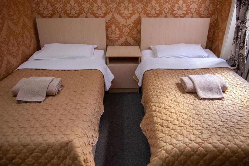 Двухместный (Бюджетный двухместный номер с 2 отдельными кроватями) отеля Hotel Orzu, Ташкент