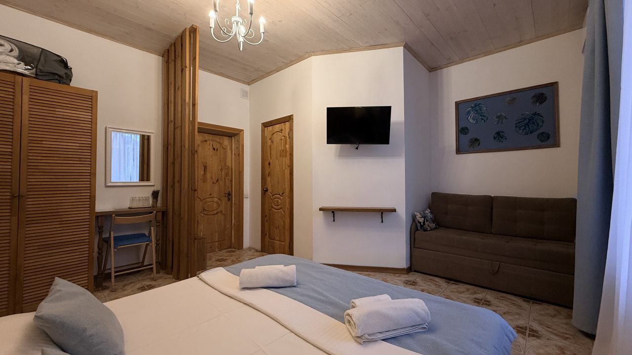 Трехместный (Стандарт ( 1*2,0 сп + диван)), Гостевой дом Villa Koronello