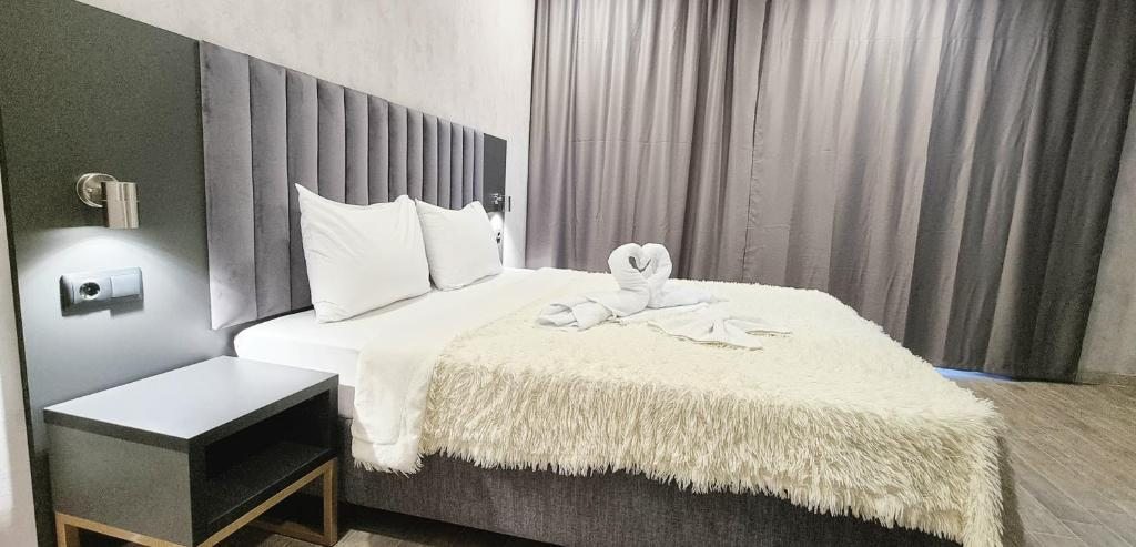 Двухместный (Двухместный номер Делюкс с 1 кроватью или 2 отдельными кроватями) отеля Аква&Бриз, Лоо