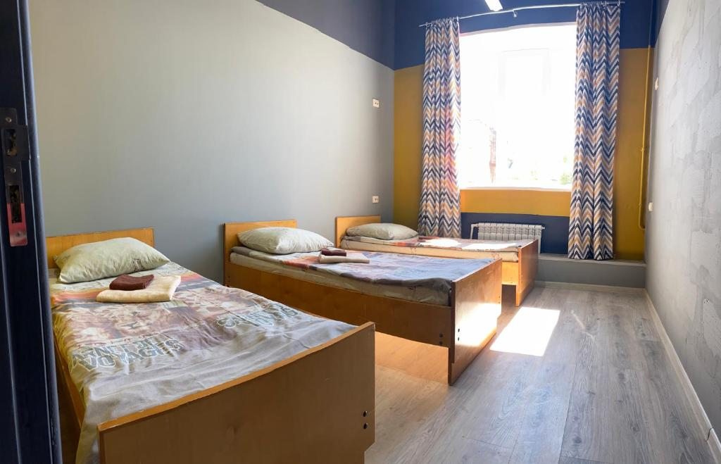 Пятиместный (Кровать в общем 5-местном номере для мужчин и женщин) хостела Паркинг, Северодвинск