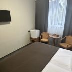 Комфортный двухместный номер в классическом спокойном стиле.