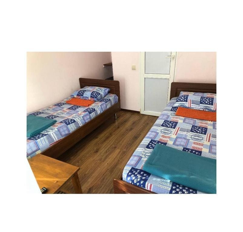 Двухместный (Бюджетный двухместный номер с 2 отдельными кроватями), Гостевой дом Аэробус