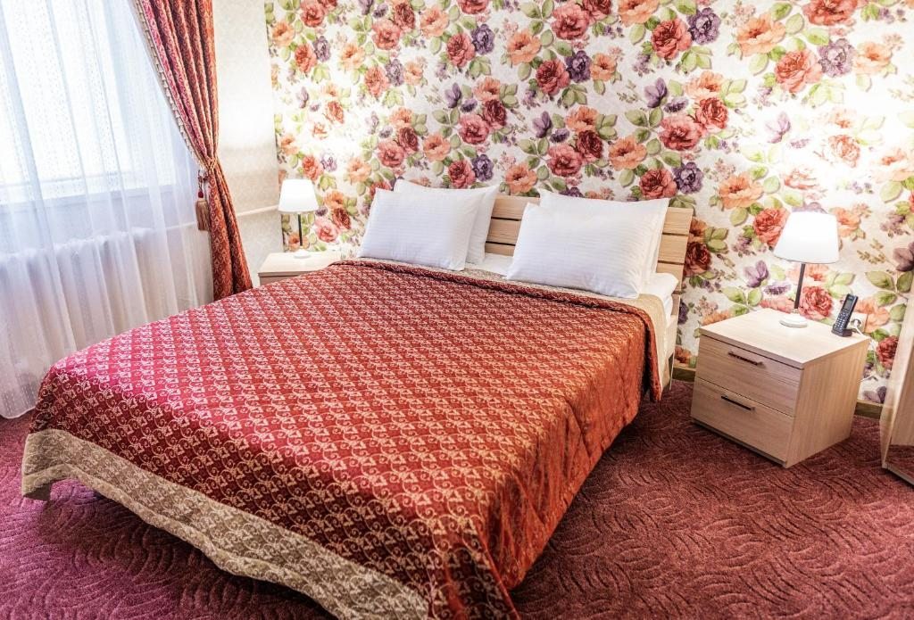 Двухместный (Улучшенный двухместный номер с 1 кроватью или 2 отдельными кроватями) отеля Парус, Тюмень