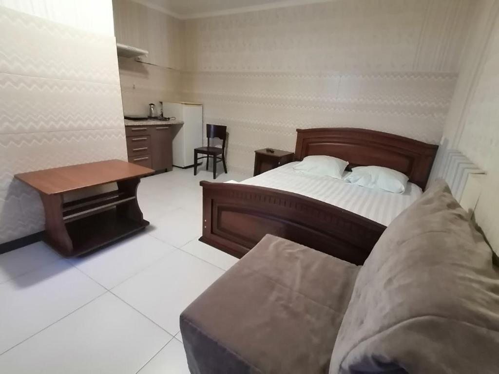 Трехместный (Трехместный номер с основными удобствами), Гостевой дом Эмилия на Православной