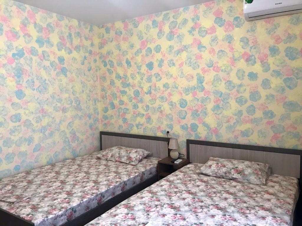Двухместный (Двухместный номер Делюкс с 2 отдельными кроватями) гостевого дома Белый Лебедь, Анапа
