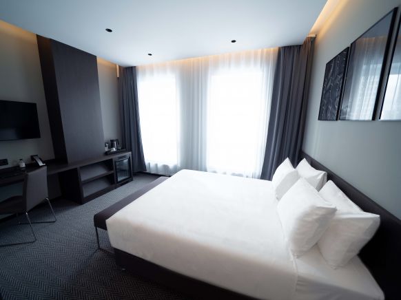 Фотография номера гостиницы FarFour Inn & Suite