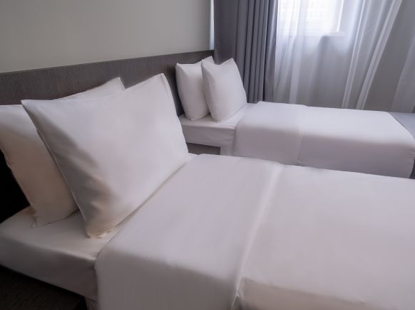 Фотография номера гостиницы FarFour Inn & Suite