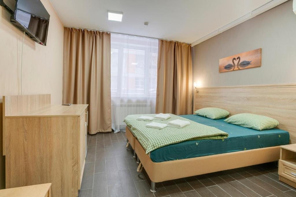 Двухместный (Большой двухместный номер с 1 кроватью или 2 отдельными кроватями) мини-отеля Ладомир Болотниковская, Москва