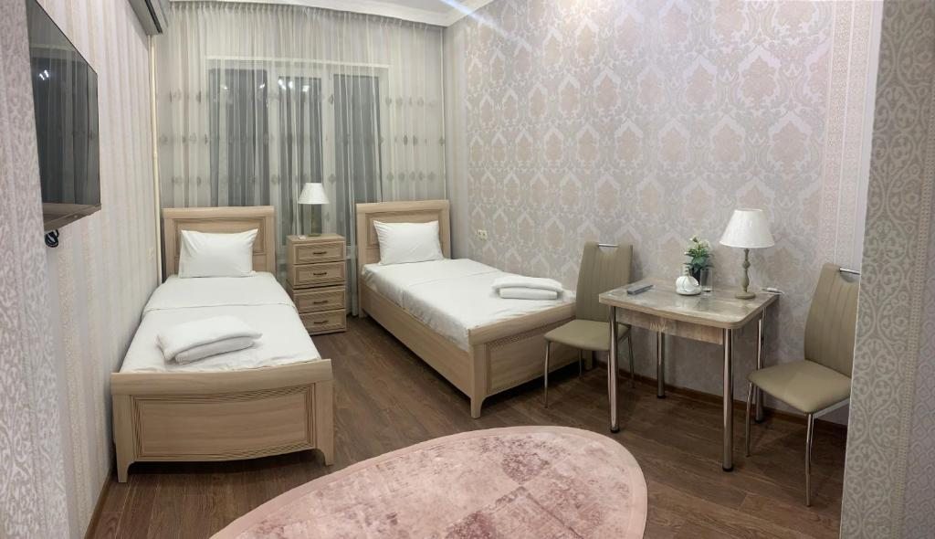Двухместный (Стандартный двухместный номер с 2 отдельными кроватями) отеля Лилия, Москва