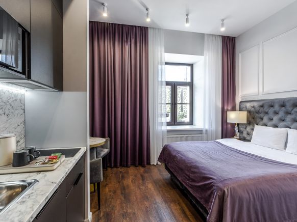 Фотография номера апарт отеля Acqualina