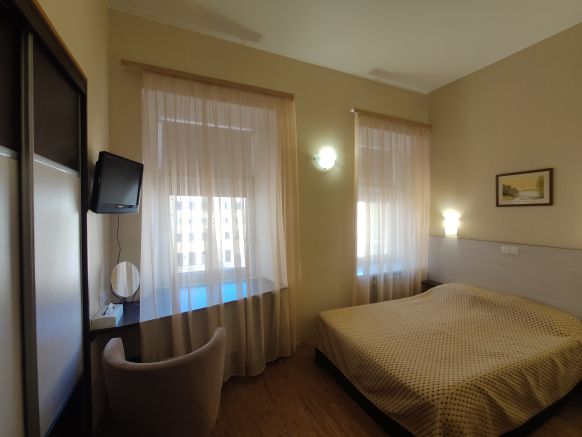 Фотография номера гостевого дома История