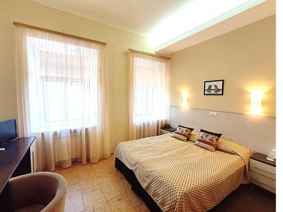 Фотография номера гостевого дома История