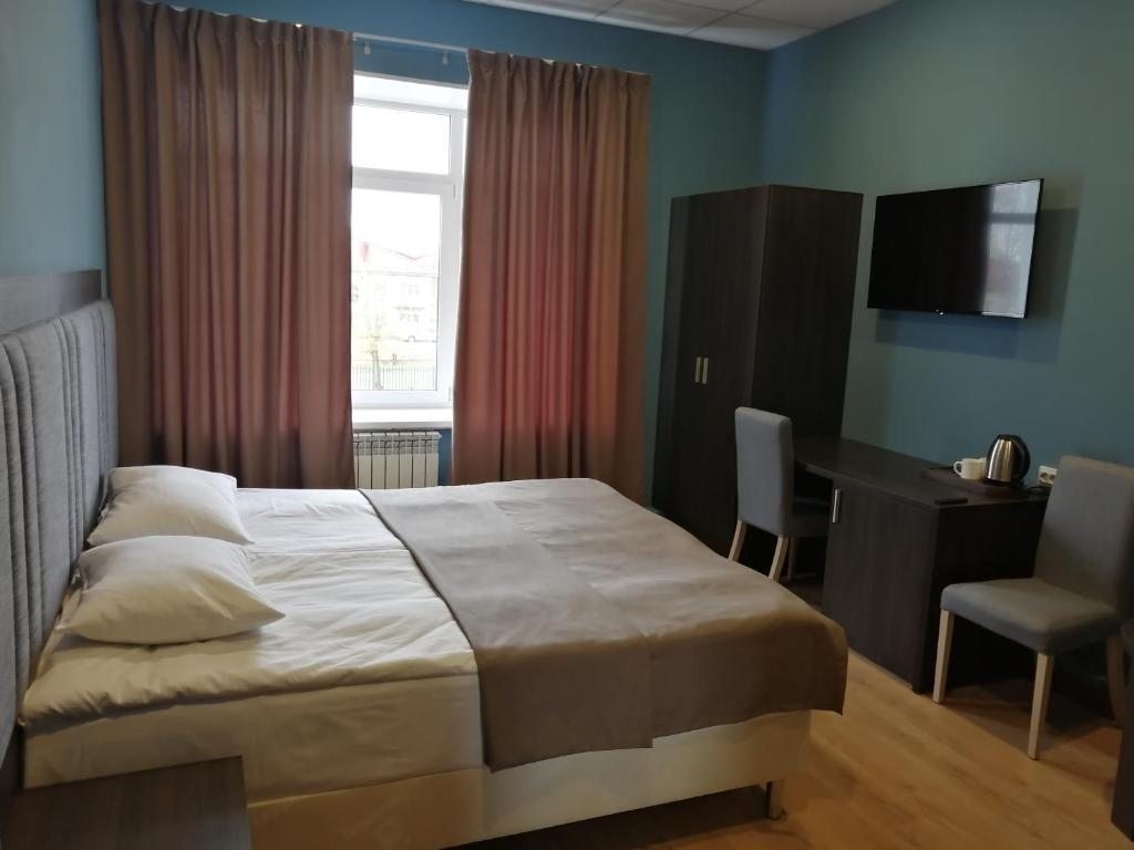 Двухместный (Улучшенный двухместный номер с 1 кроватью или 2 отдельными кроватями) отеля Forest Hotel, Верхняя Тура