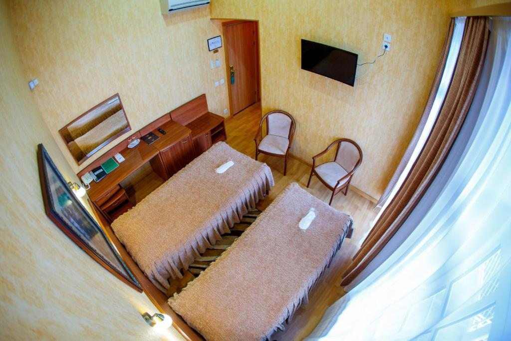 Двухместный (Небольшой двухместный номер с 2 отдельными кроватями) отеля Волжская жемчужина, Ярославль