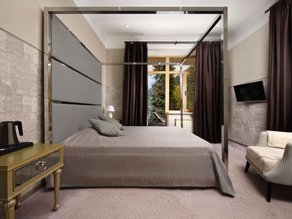 Фотография номера гостиницы Домбай Палас