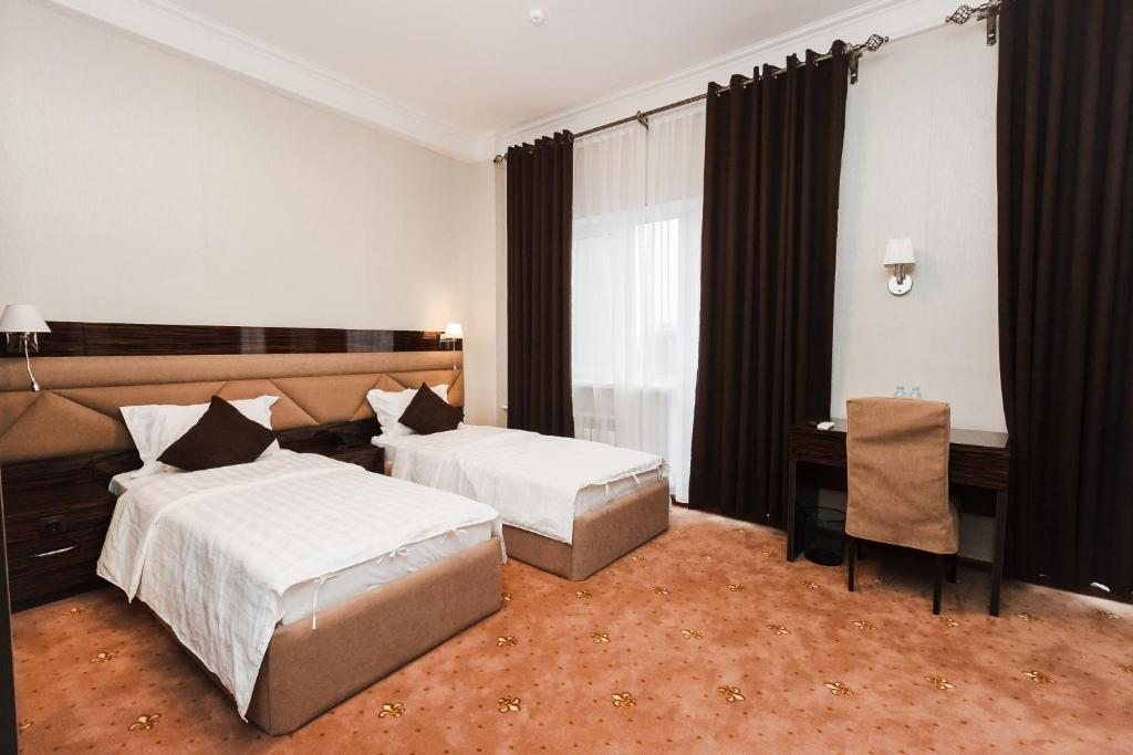 Двухместный (Стандартный двухместный номер с 2 отдельными кроватями) отеля Beluga Hotel, Атырау