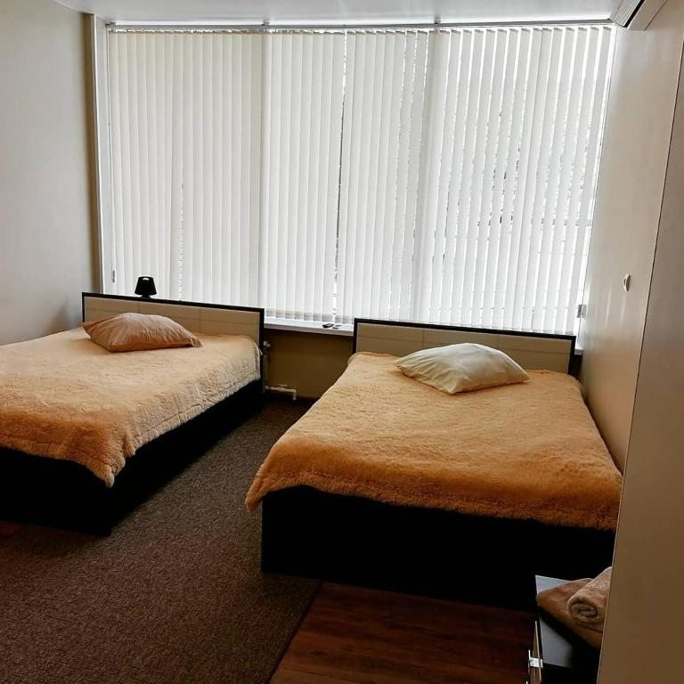 Двухместный (Двухместный номер с 2 двуспальными кроватями) гостиницы Кавалерово