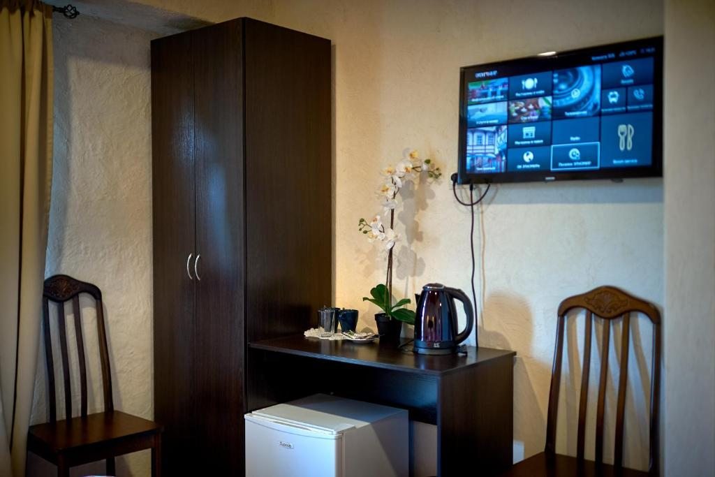 Двухместный (Стандартный двухместный номер с 2 двуспальными кроватями) отеля Центральная Азия, ЭТНОМИР, Петрово