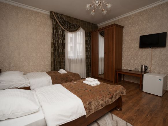 Фотография номера мини отеля Снежная Королева Домбай