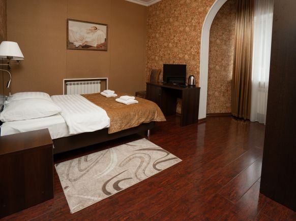 Фотография номера мини отеля Снежная Королева Домбай