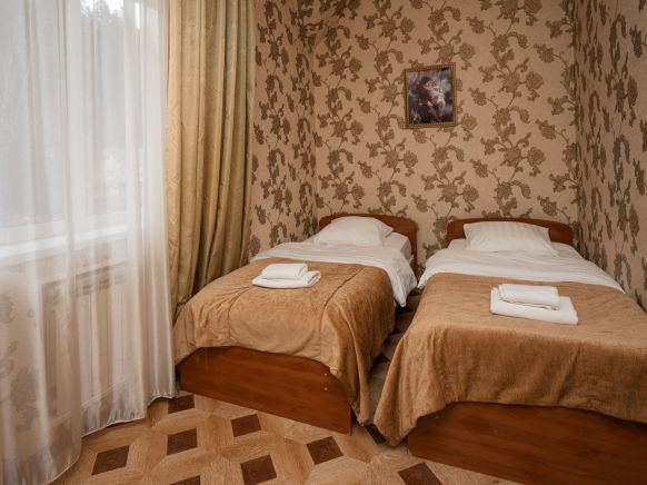 Фотография номера мини отеля Снежная Королева Домбай