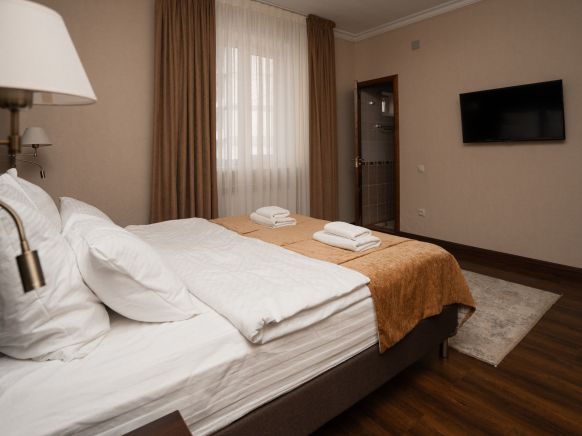 Фотография номера мини отеля Снежная Королева Домбай