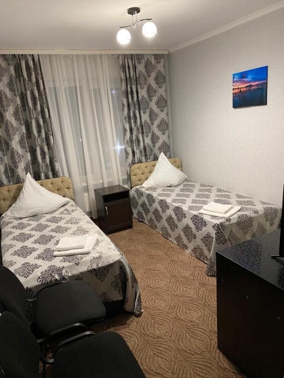 Двухместный (Двухместный номер с 2 отдельными кроватями) отеля Дружба, Нефтекумск