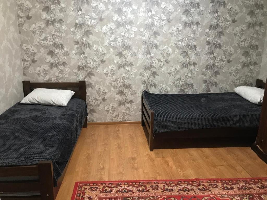 Двухместный (Бюджетный двухместный номер с 2 отдельными кроватями) гостевого дома У речки, Хунзах
