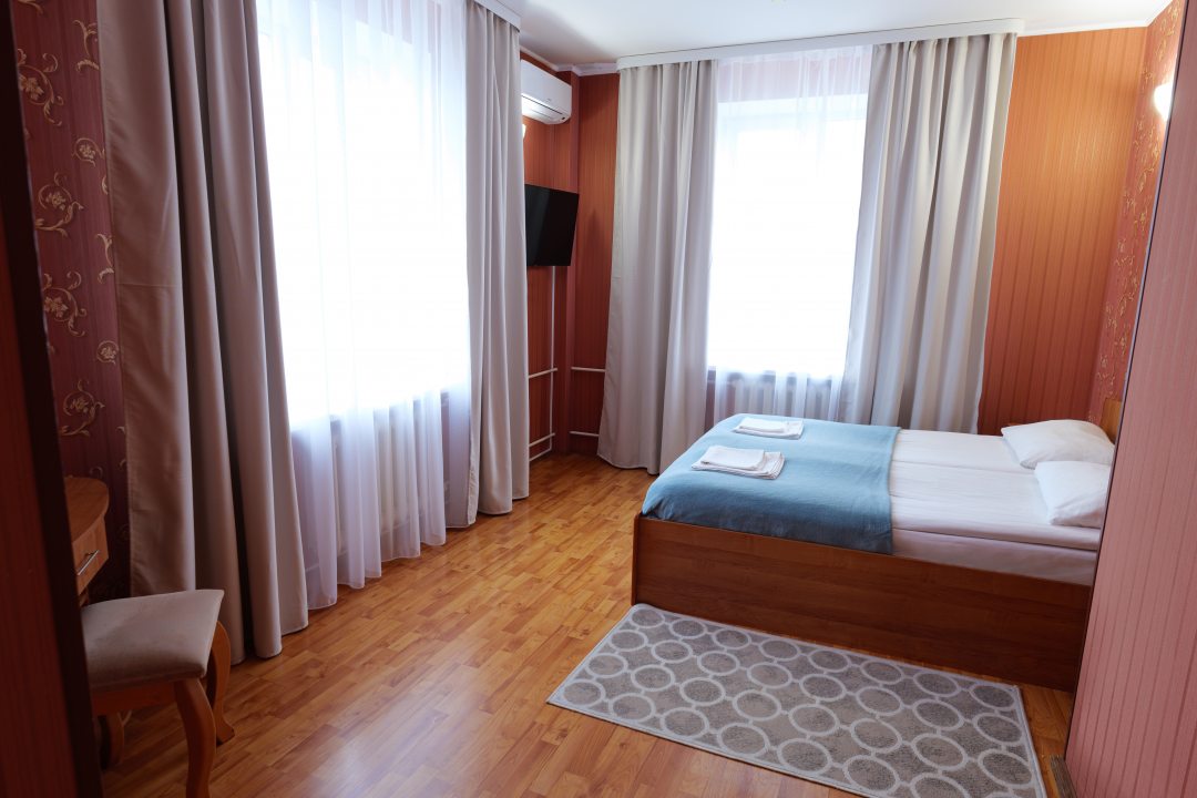 Двухместный (Двухместный номер с 1 кроватью и собственной ванной комнатой) мини-отеля Радуга, Кунья, Псковская область