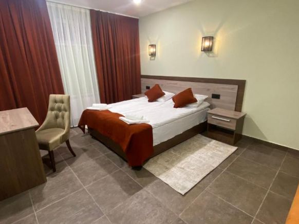 Фотография номера квартиры Апартаменты Горная Сказка