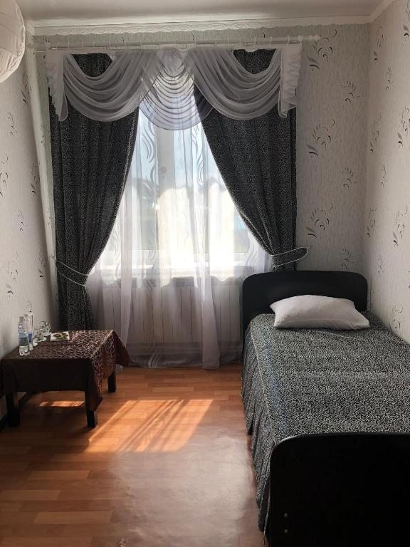 Двухместный (Двухместный номер с 2 отдельными кроватями и душем) мини-отеля Гранд, Месягутово
