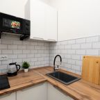 Апартаменты (На Красном факеле 25/1), Апартаменты Welcome Apartment