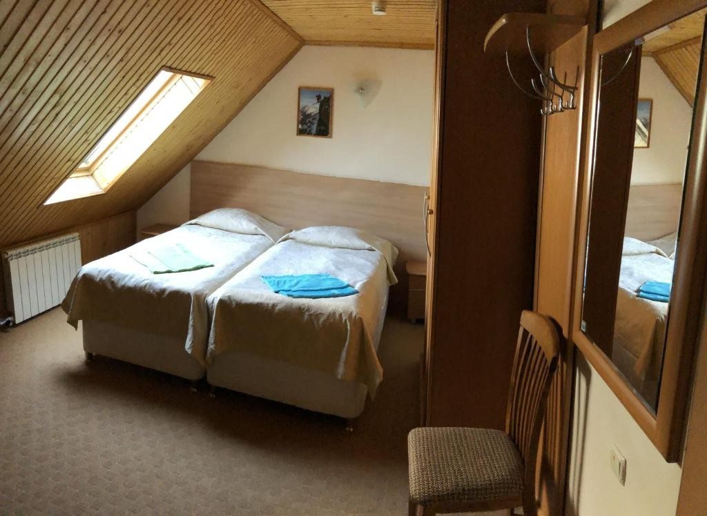 Двухместный (Двухместный номер с 1 кроватью или 2 отдельными кроватями) гостевого дома Чыран-Азау, Терскол