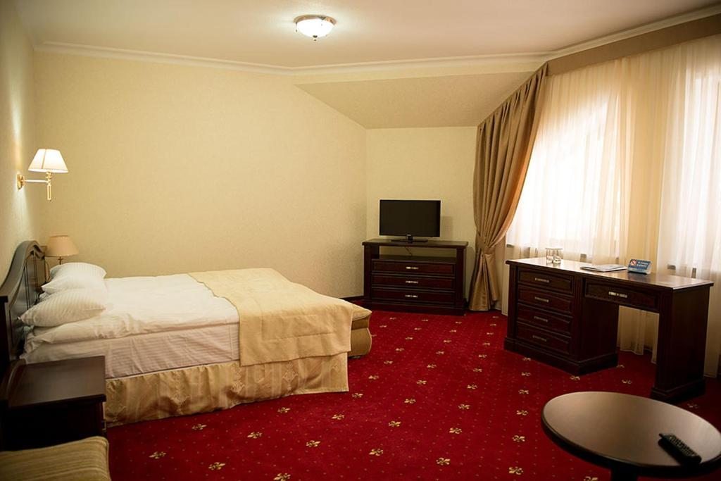 Двухместный (Улучшенный двухместный номер с 1 кроватью или 2 отдельными кроватями) отеля Кристалл 139, Терскол