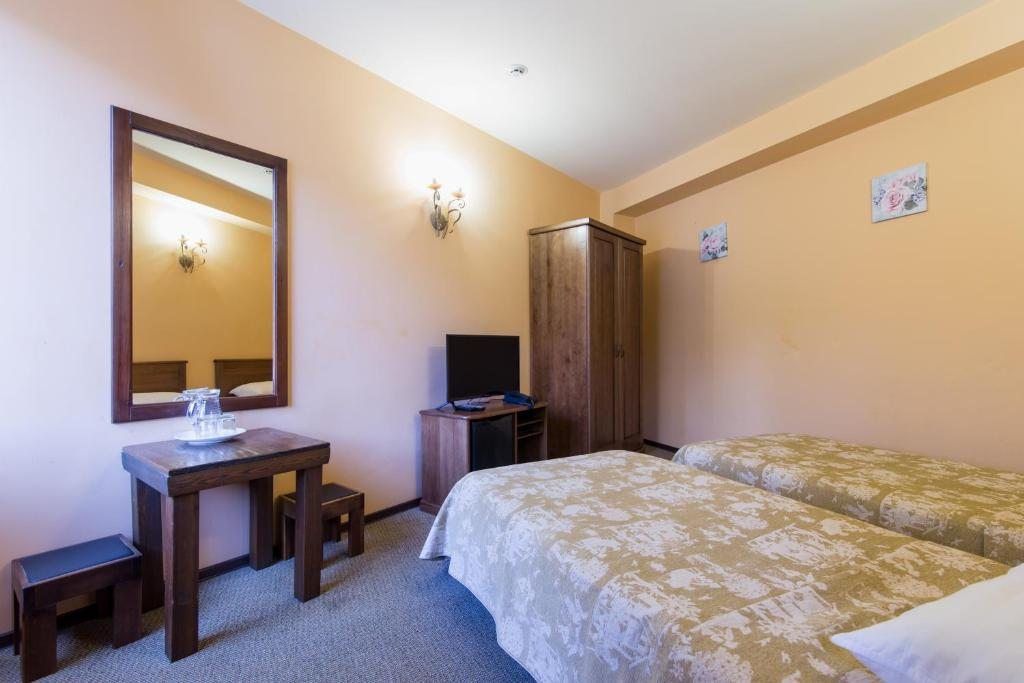 Двухместный (Стандартный двухместный номер с 2 отдельными кроватями) гостиницы Мелодия гор, Эсто-Садок