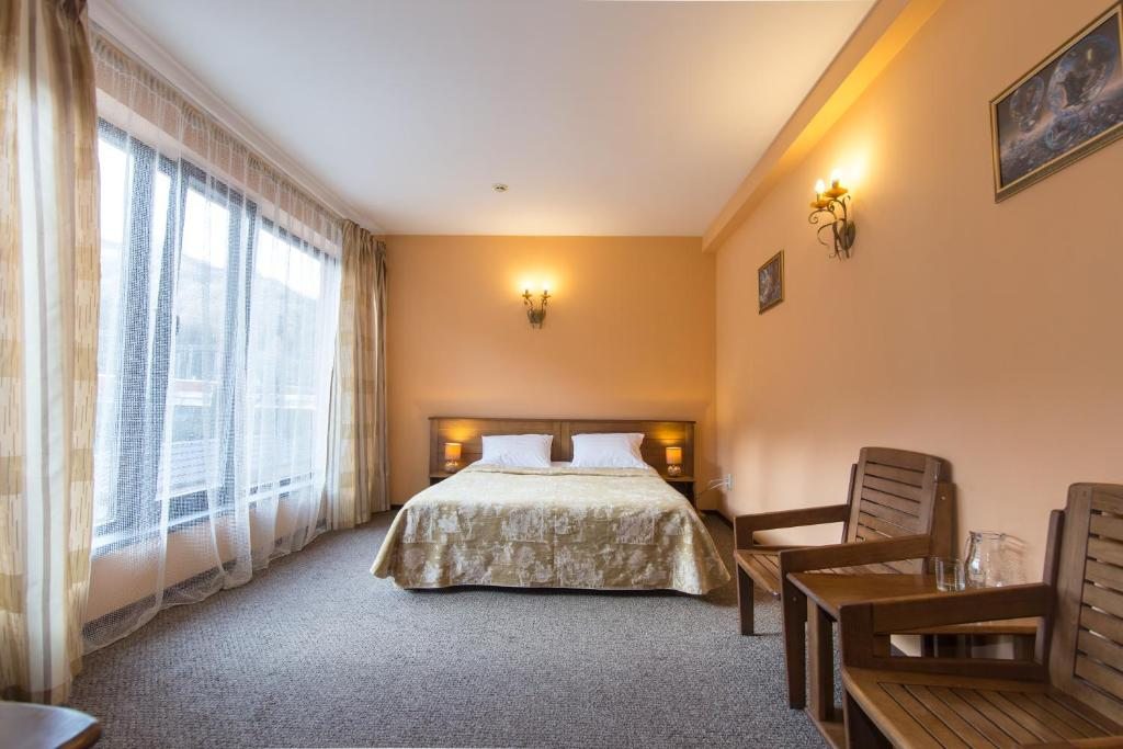 Двухместный (Улучшенный двухместный номер с 1 кроватью или 2 отдельными кроватями) гостиницы Мелодия гор, Эсто-Садок