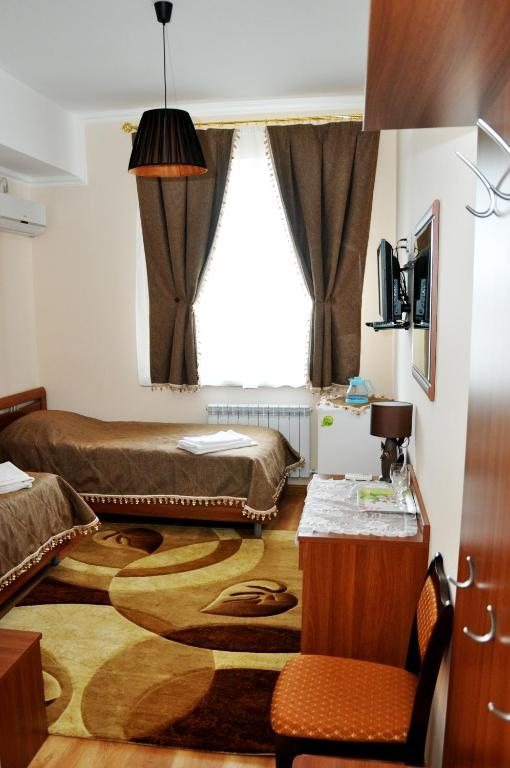 Двухместный (Двухместный номер с 2 отдельными кроватями и душем) отеля Восток, Сорочинск