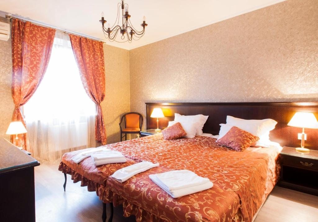 Двухместный (Улучшенный двухместный номер с 1 кроватью или 2 отдельными кроватями) отеля Аквамарин, Подрезово