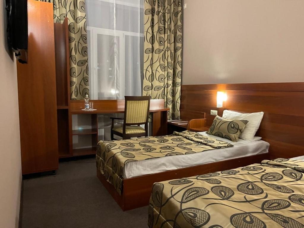 Двухместный (Двухместный номер с 2 отдельными кроватями) отеля Сова на Советской, Балаково