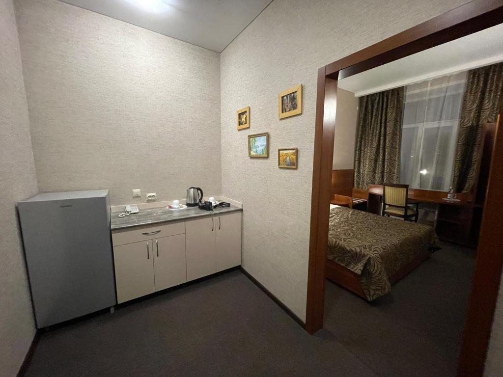 Четырехместный (Номер с 2 кроватями размера «king-size») отеля Сова на Советской, Балаково